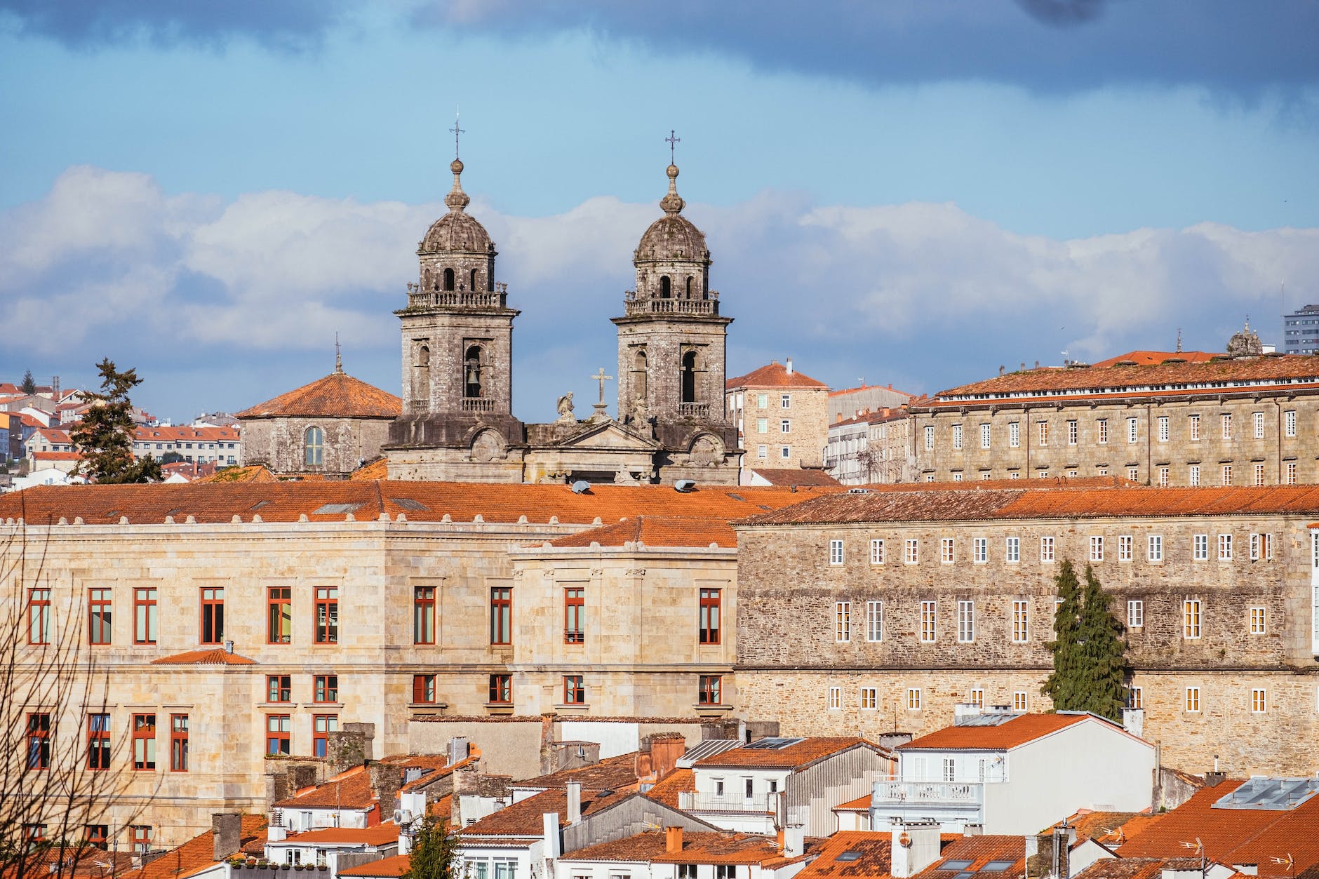 city buildings under the blue sky