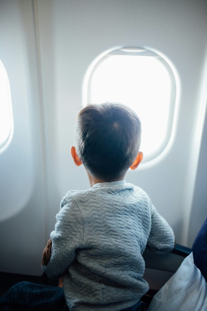 Child flying on an airplane