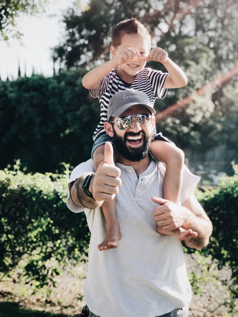 Madrid Parks - Man having fun with his child 