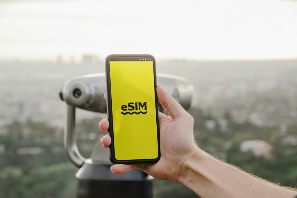 Android phone user showcasing the eSIM digital interface