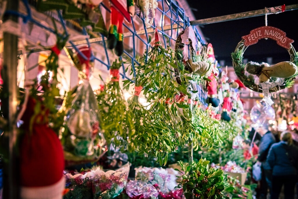 Christmas Decorations At Market Stall At Night - Madrid, Spain