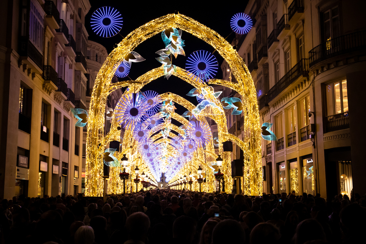 Thousands people enjoying the Lights Christmas Spectacle "The Christmas Forest", in famous Street Marquez de Larios, the centre of Malaga.