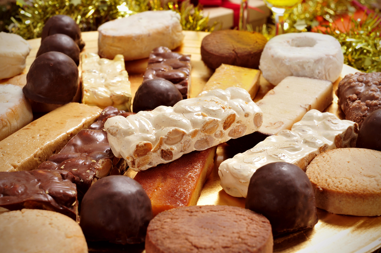 Closeup of a tray with different turron, mantecados and polvorones, typical christmas sweets in Spain