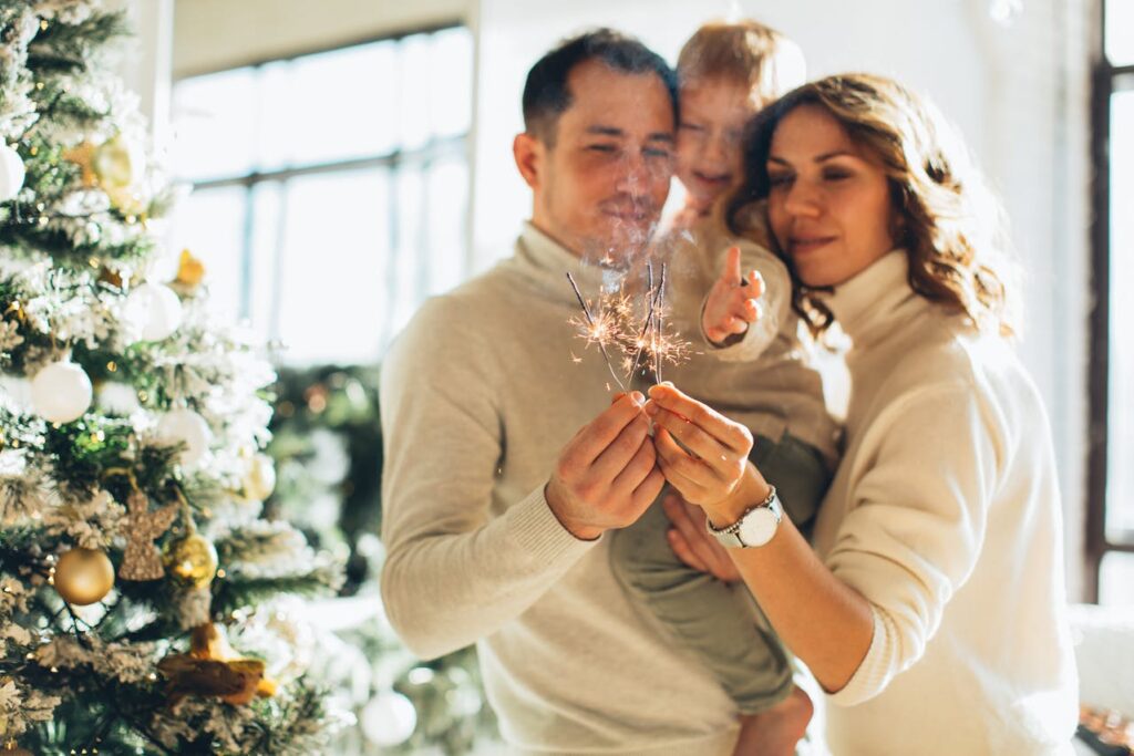 Family enjoying their Christmas travel gifts during a holiday trip