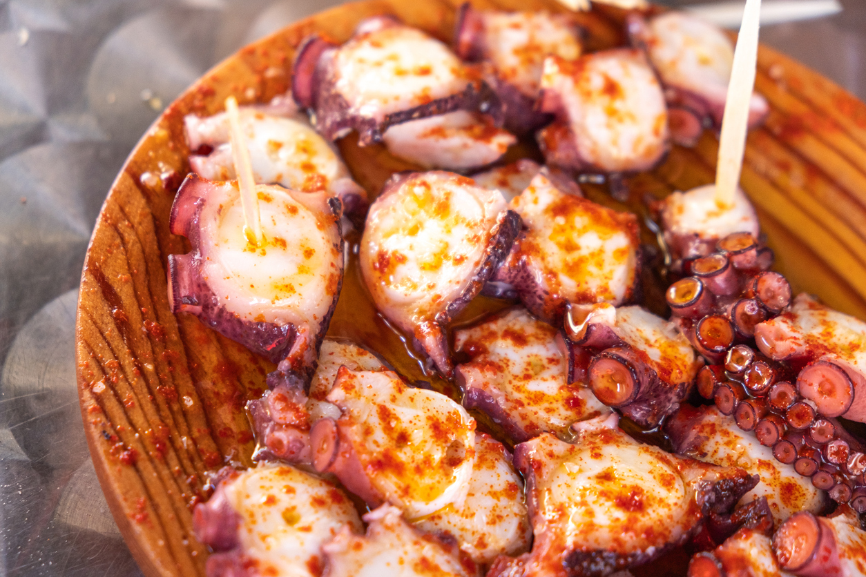 Portion of pulpo a feira, traditional octopus recipe in Galicia. Spain. Spanish cuisine in Spain.