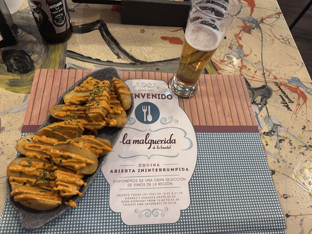 Patatas bravas and beer at La Malquerida—what to eat in Toledo, Spain