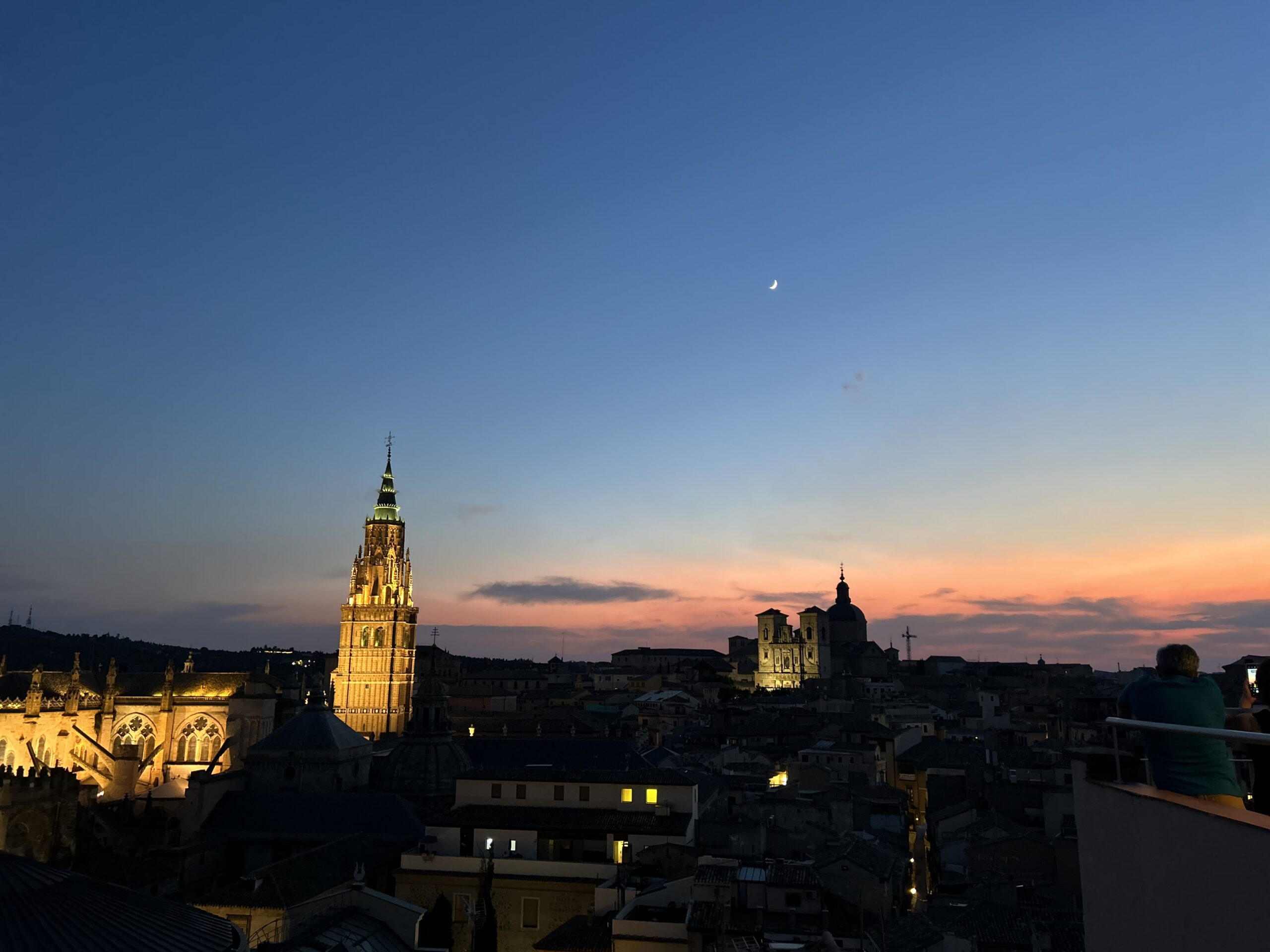 Evening drinks with cathedral views from the Carlos Quinto rooftop in Toledo, Spain