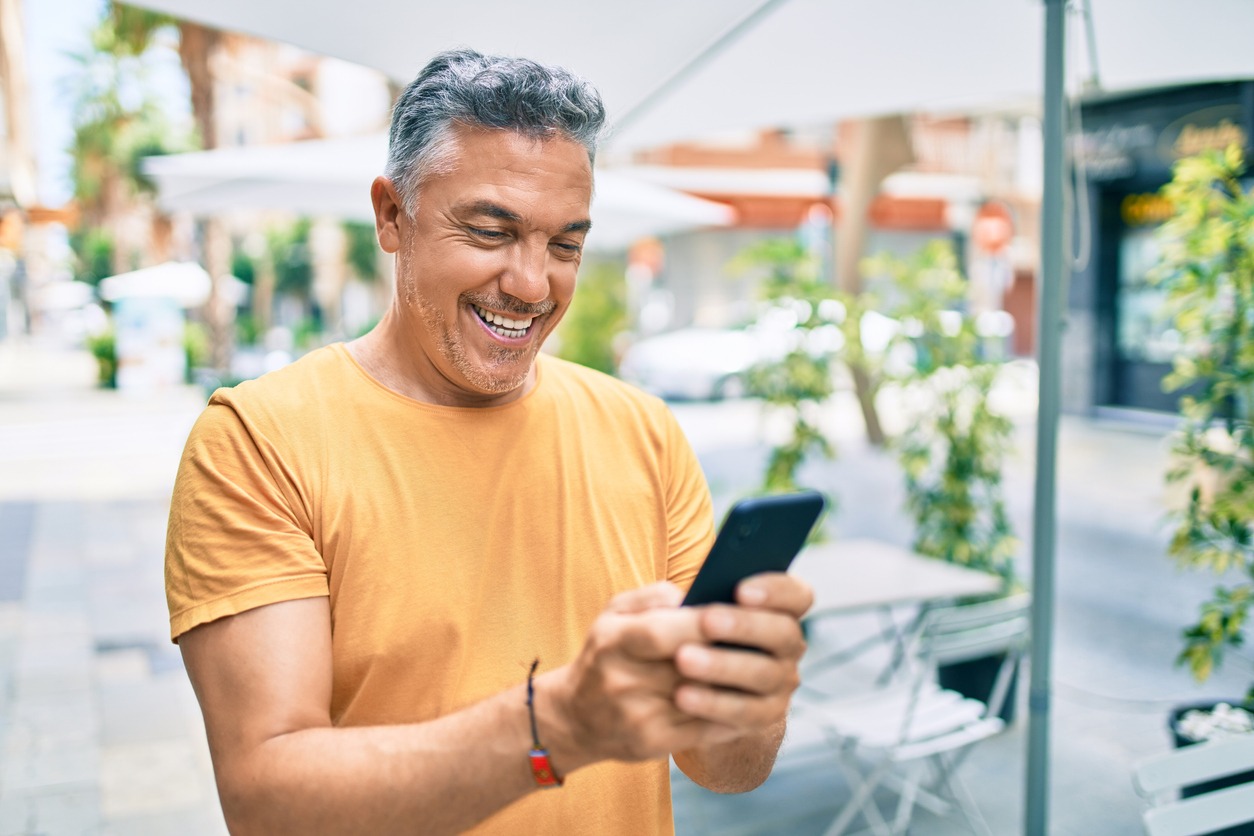 Tourist using a phone in Spain while traveling